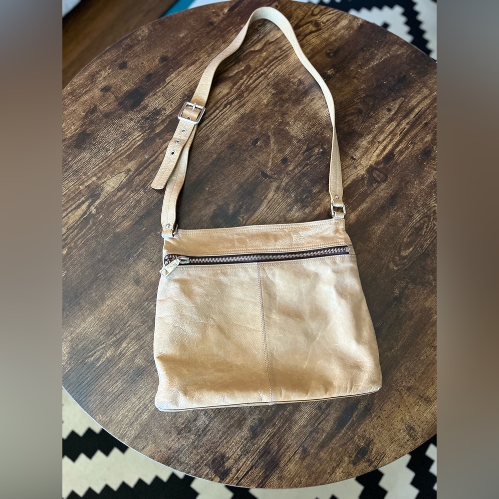 Hobo the original leather Crossbody purse. Tan leather. Used condition.